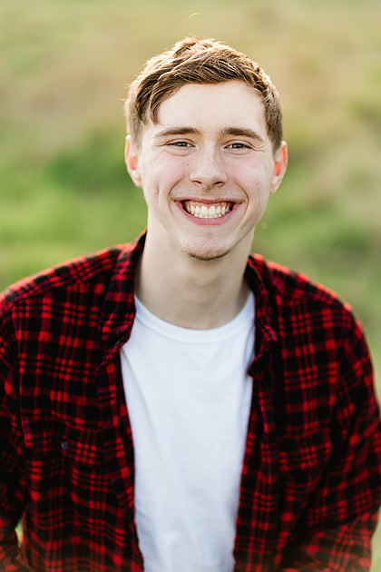 Senior boy by the river in Vancouver, WA