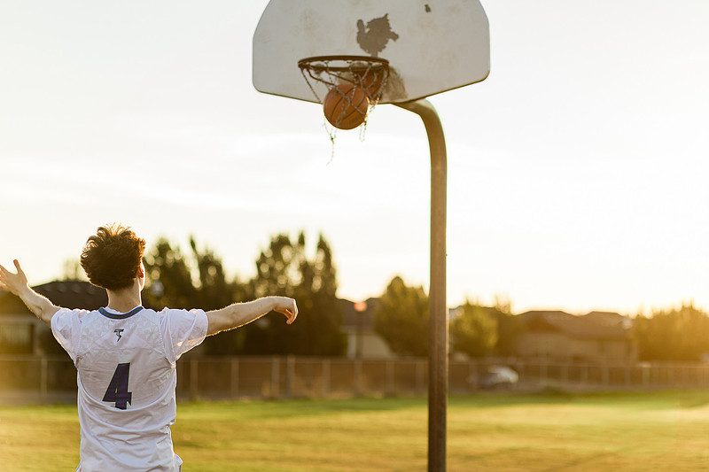 Senior boy on the basketball court