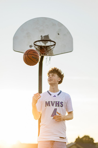 Senior boy on the basketball court