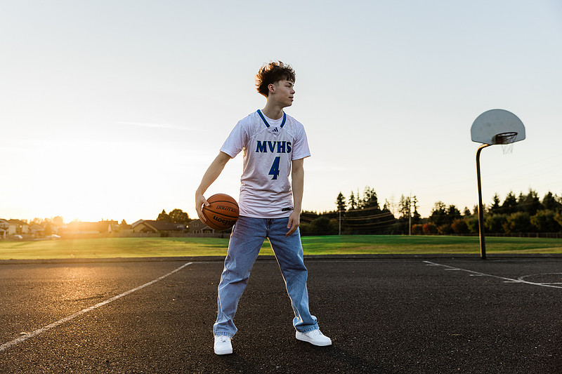 Senior boy on the basketball court