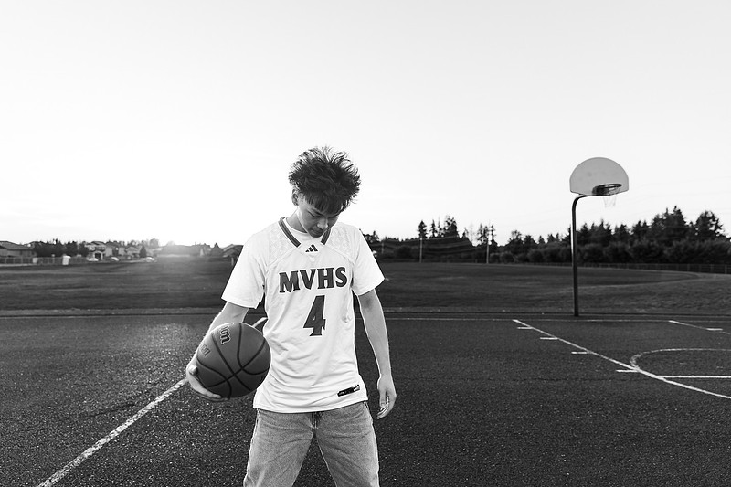 Senior boy on the basketball court