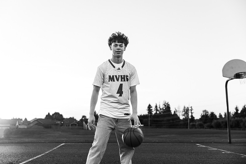 Senior boy on the basketball court