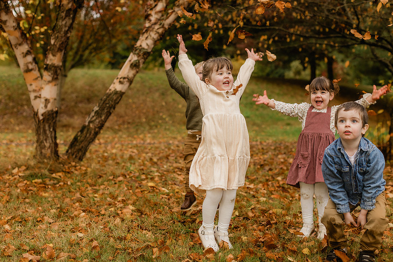 Grown friends and little friends in the fall