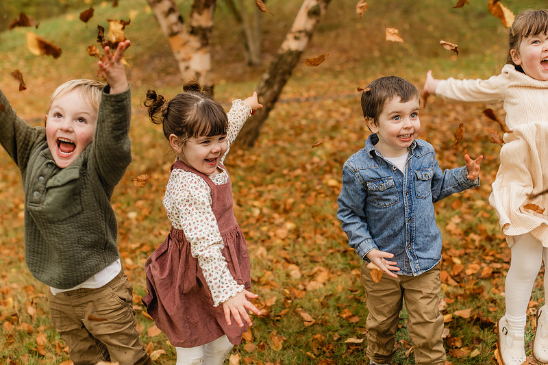 Grown friends and little friends in the fall