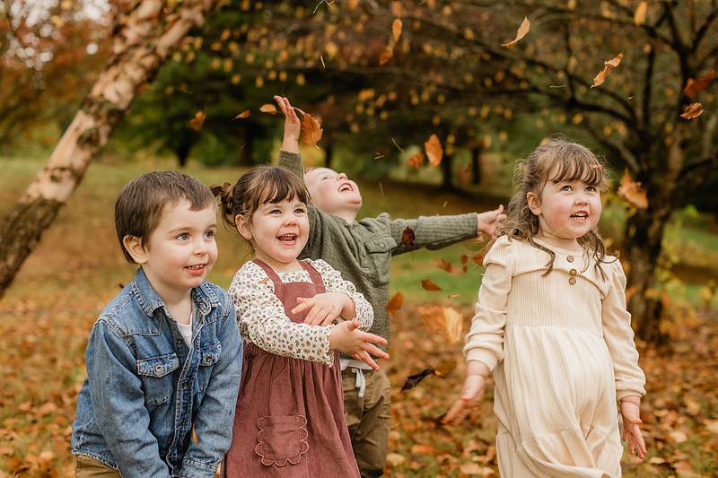 Grown friends and little friends in the fall