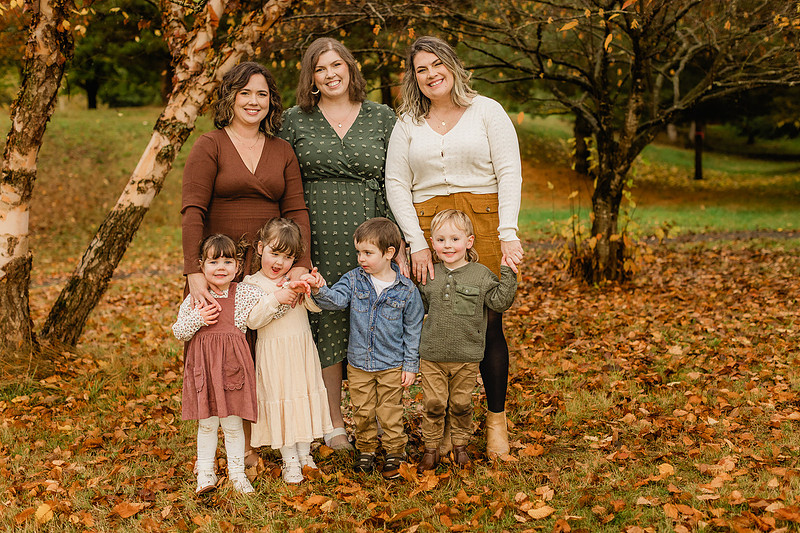 Grown friends and little friends in the fall