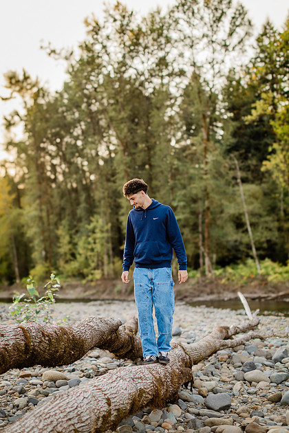 Senior boy by the Lewisville River in WA
