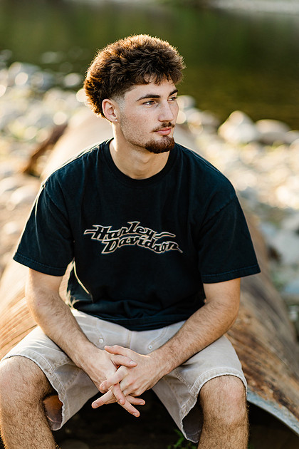 Senior boy by the Lewisville River in WA