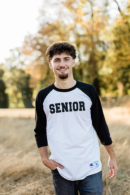 Senior boy by the Lewisville River in WA