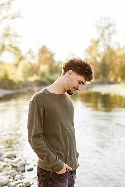 Senior boy by the Lewisville River in WA