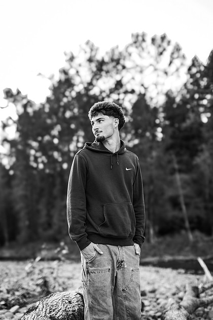 Senior boy by the Lewisville River in WA