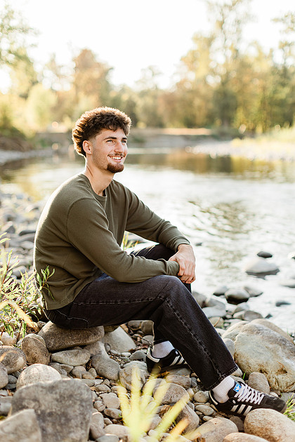 Senior boy by the Lewisville River in WA