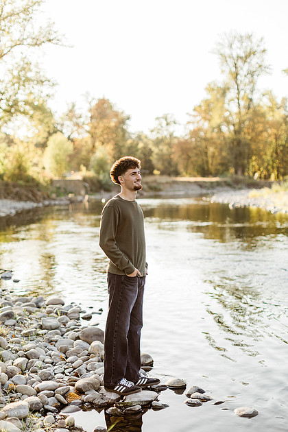 Senior boy by the Lewisville River in WA