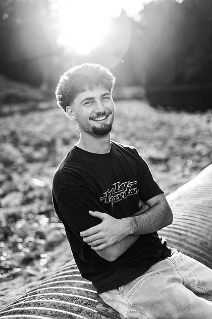 Senior boy by the Lewisville River in WA