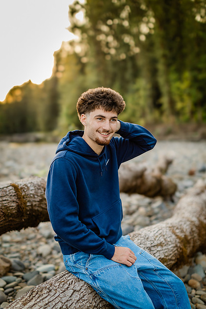 Senior boy by the Lewisville River in WA