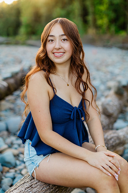 Girl senior athlete on a basketball court and by the river