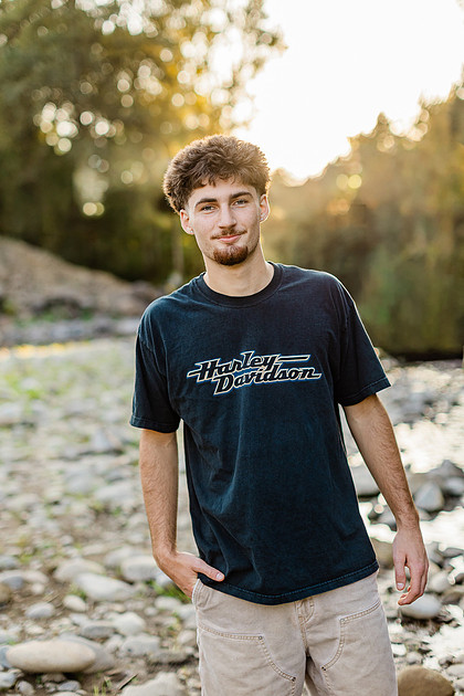 Senior boy by the Lewisville River in WA