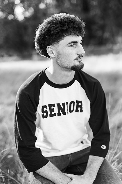 Senior boy by the Lewisville River in WA