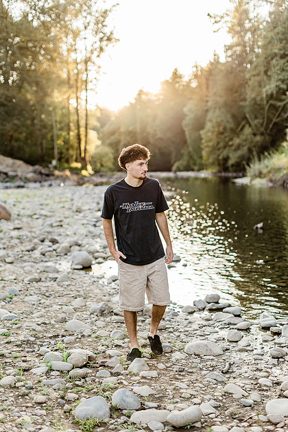Senior boy by the Lewisville River in WA