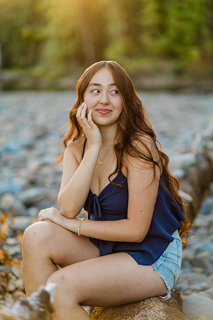 Girl senior athlete on a basketball court and by the river