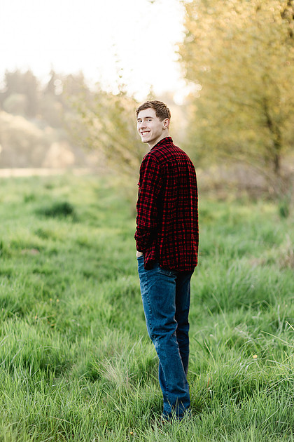 Senior boy by the river in Vancouver, WA
