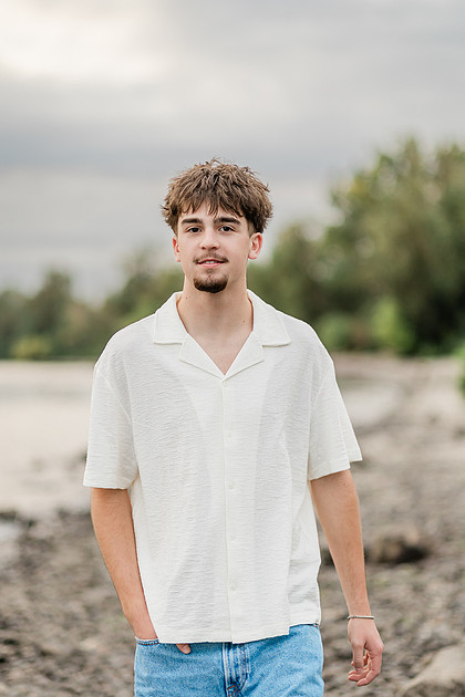 Senior boy by the Columbia River in downtown Vancouver, WA