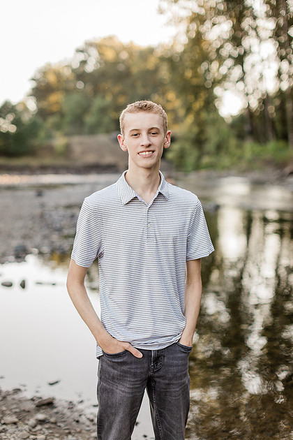 Senior boy by a river in Vancouver, WA