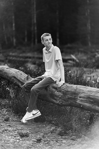 Senior boy by a river in Vancouver, WA
