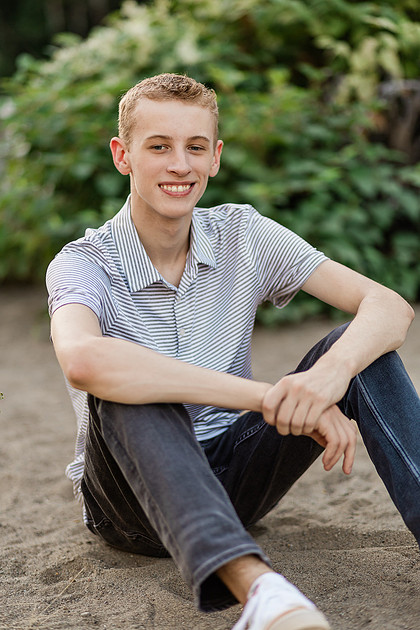 Senior boy by a river in Vancouver, WA