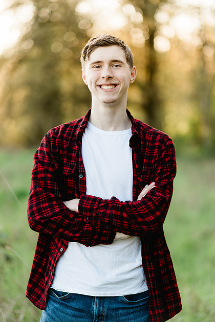 Senior boy by the river in Vancouver, WA