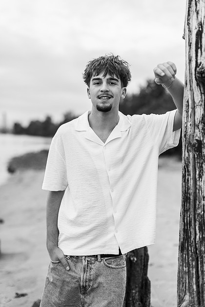 Senior boy by the Columbia River in downtown Vancouver, WA
