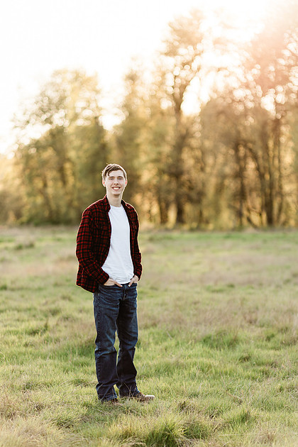 Senior boy by the river in Vancouver, WA
