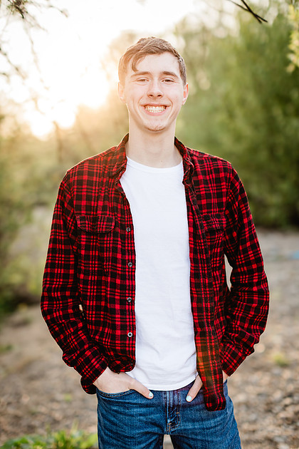 Senior boy by the river in Vancouver, WA